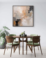 a dining room table with green chairs and a painting on the wall