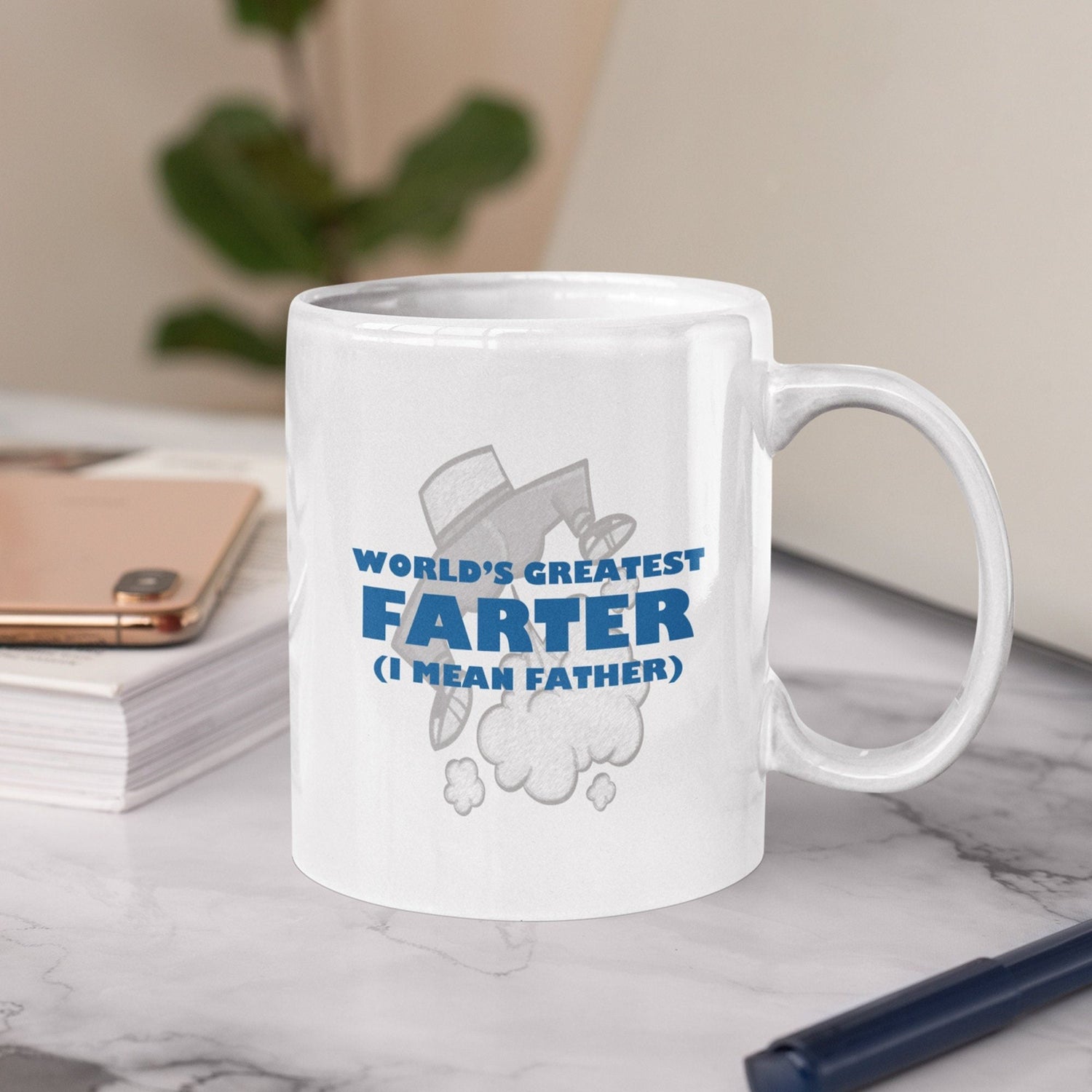 a white coffee mug sitting on top of a table